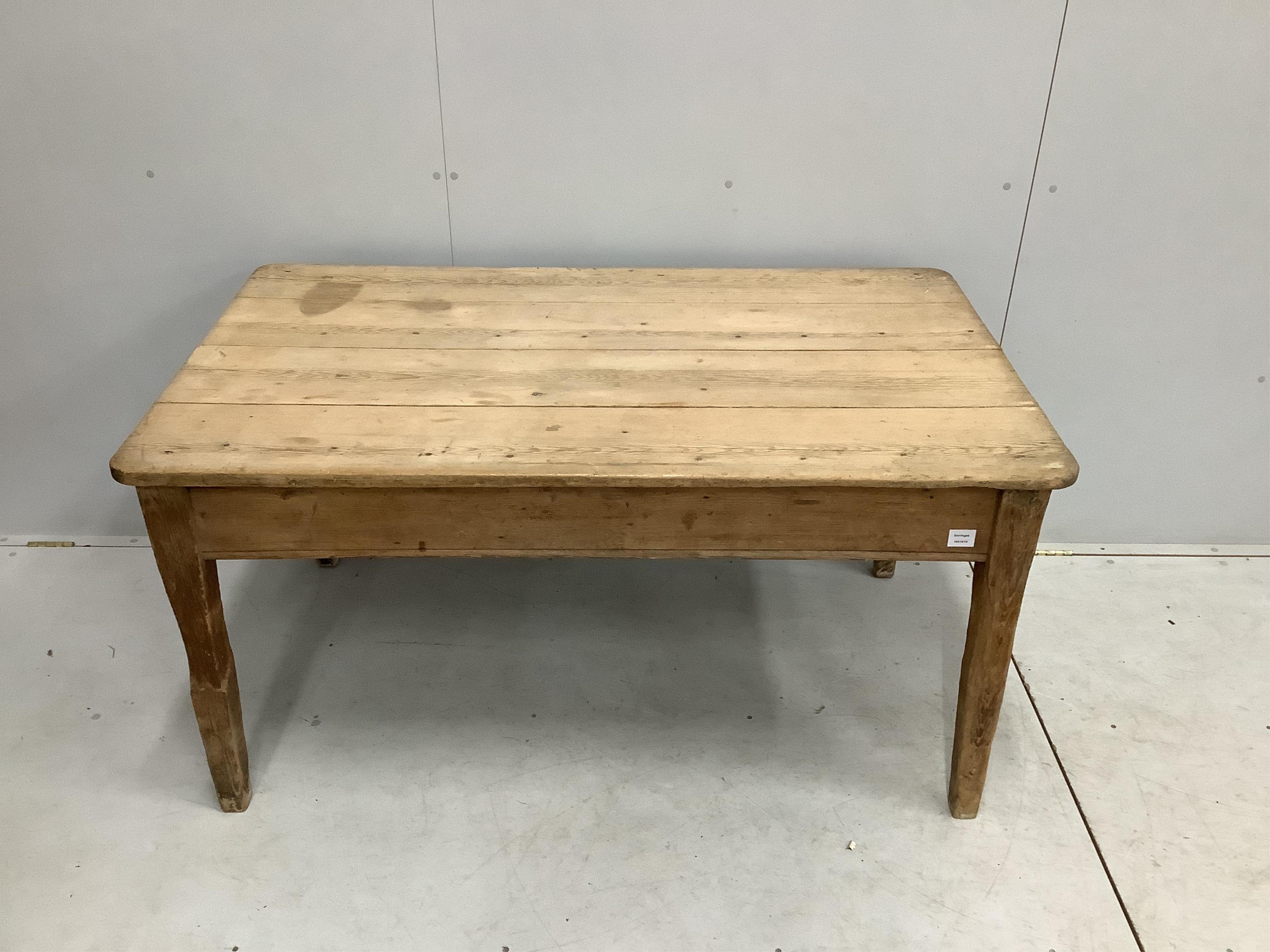 A 19th century rectangular scrubbed pine kitchen table fitted drawer on square tapered legs, width 144cm, depth 85cm, height 73cm. Condition - fair